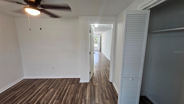 hall featuring dark wood-type flooring