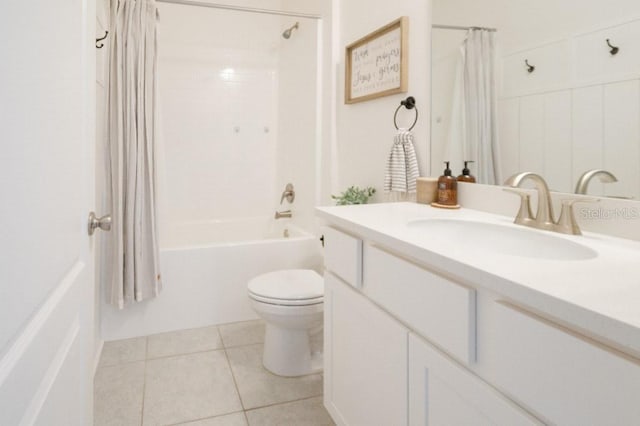 full bathroom featuring shower / bath combination with curtain, vanity, toilet, and tile patterned flooring