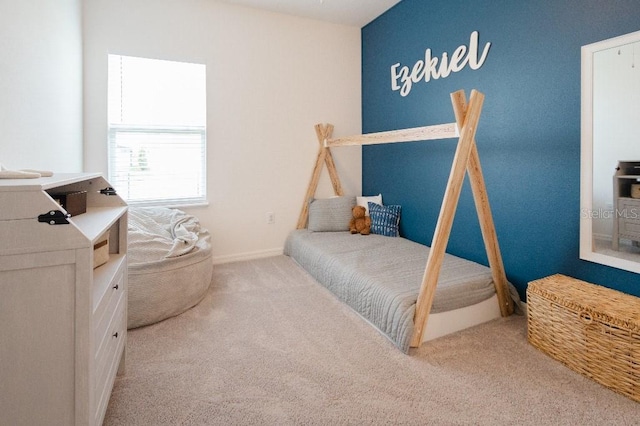 bedroom featuring carpet