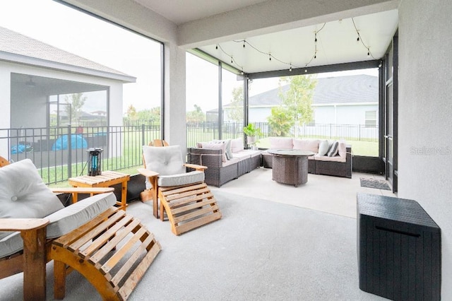 sunroom / solarium with plenty of natural light