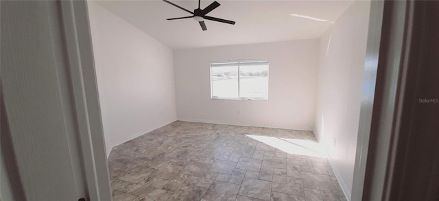 unfurnished room with ceiling fan