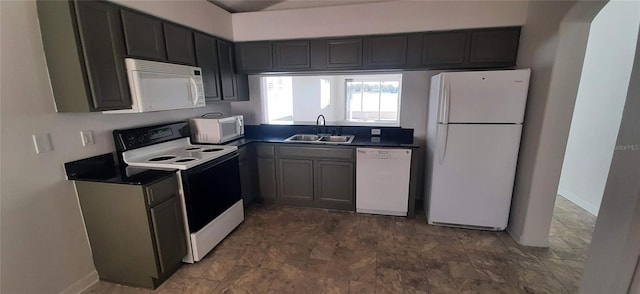 kitchen with sink and white appliances