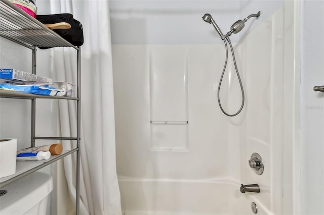 bathroom with shower / tub combo