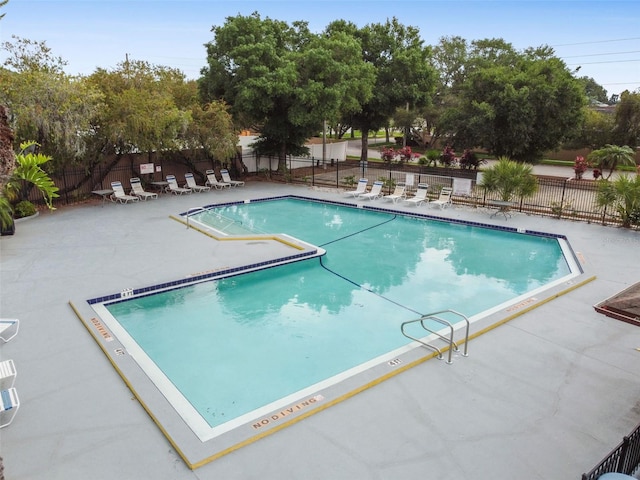 view of swimming pool featuring a patio