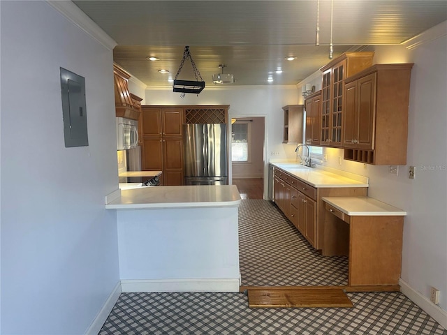 kitchen with sink, crown molding, stainless steel appliances, electric panel, and kitchen peninsula