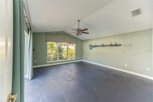 spare room featuring ceiling fan and lofted ceiling