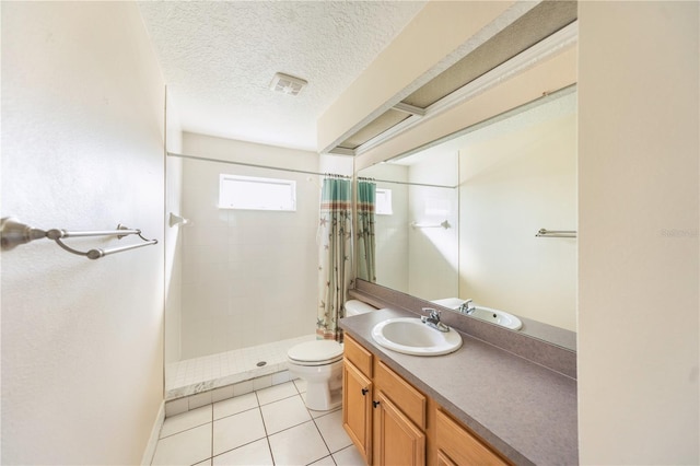 bathroom featuring tile patterned floors, toilet, curtained shower, and a textured ceiling