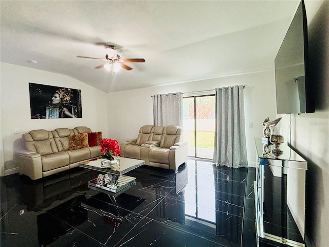 living room featuring vaulted ceiling and ceiling fan