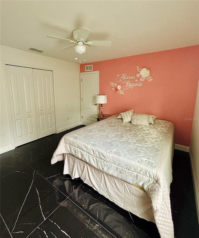 bedroom with a closet and ceiling fan