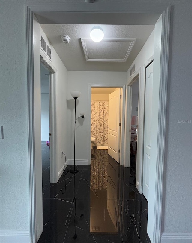 bathroom featuring a textured ceiling