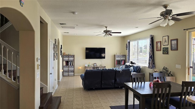 dining space featuring ceiling fan