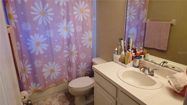 full bathroom featuring vanity, shower / bathtub combination with curtain, and toilet