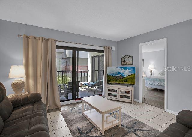 living room featuring light tile patterned floors