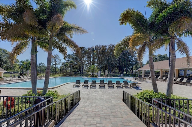 view of swimming pool featuring a patio area