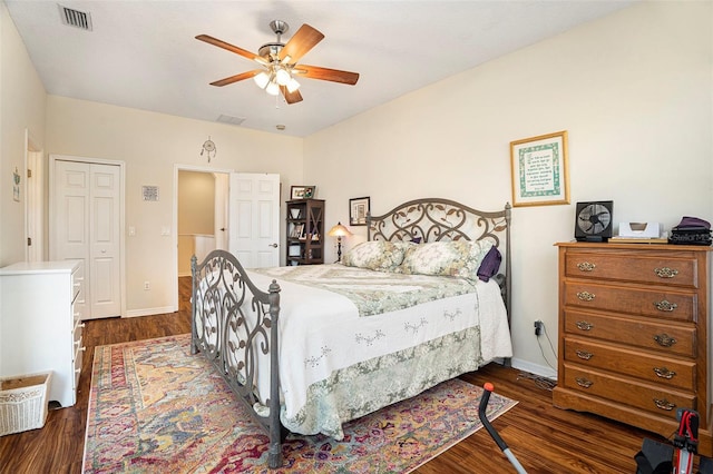 bedroom featuring ceiling fan and dark hardwood / wood-style floors