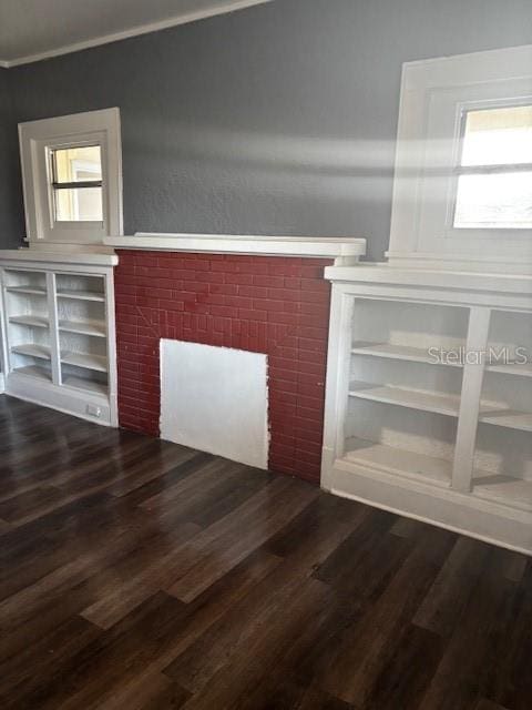 room details featuring hardwood / wood-style flooring and a fireplace