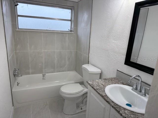 full bathroom with shower / bathing tub combination, vanity, and toilet