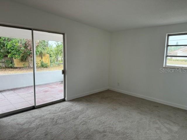 view of carpeted spare room