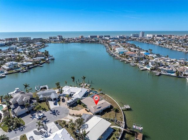 drone / aerial view with a water view