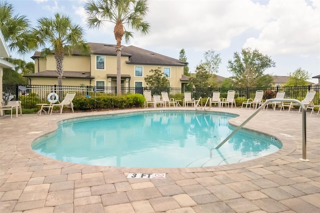 view of pool with a patio area