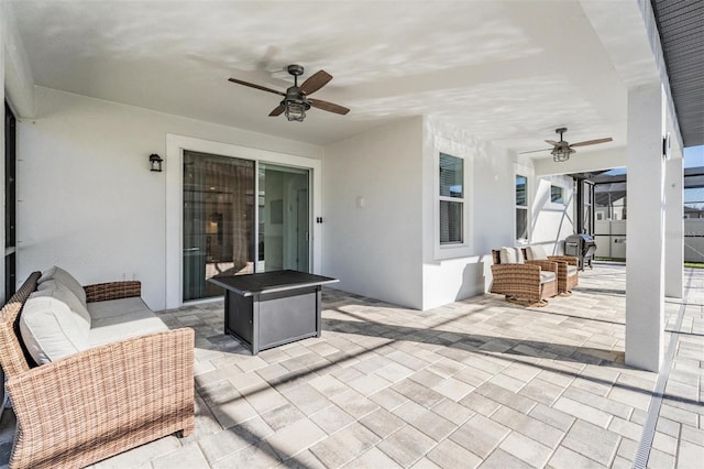 view of patio / terrace with ceiling fan and an outdoor hangout area