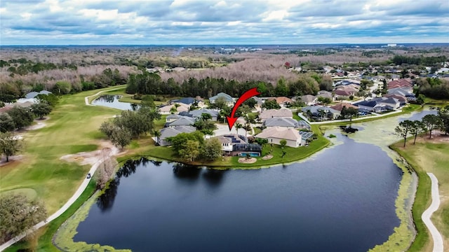 bird's eye view featuring a water view and a residential view