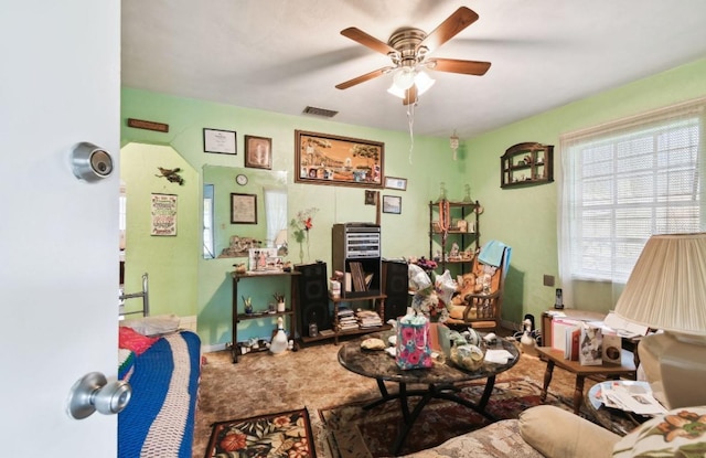 interior space featuring ceiling fan