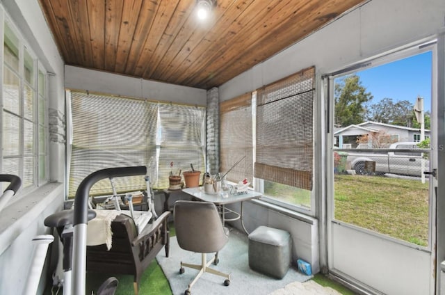 sunroom featuring wood ceiling