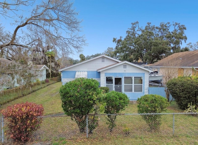 view of property exterior with a lawn