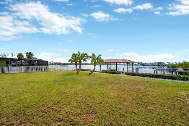 view of yard featuring a water view and a gazebo