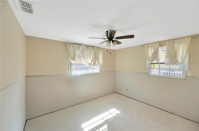 empty room with a ceiling fan