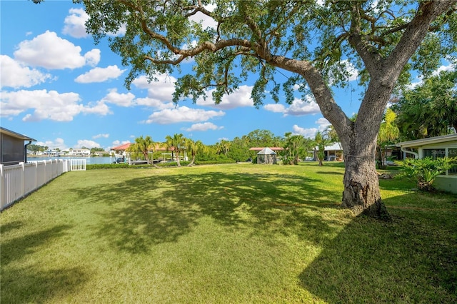 view of yard with a water view and a gazebo