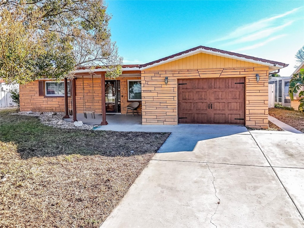 ranch-style home with a garage