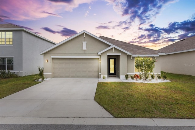 8638 Triumph Cir, Wildwood, FL 34785 - view of front facade with a garage and a lawn