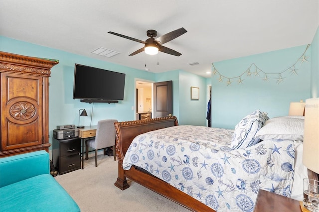 carpeted bedroom featuring ceiling fan