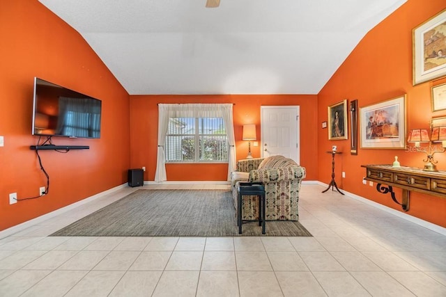 tiled living room featuring vaulted ceiling