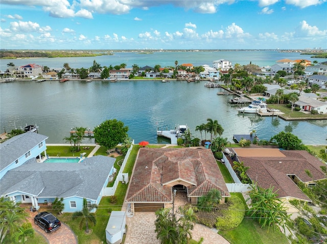 drone / aerial view with a water view