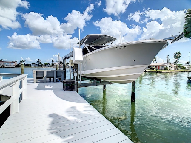 view of dock with a water view