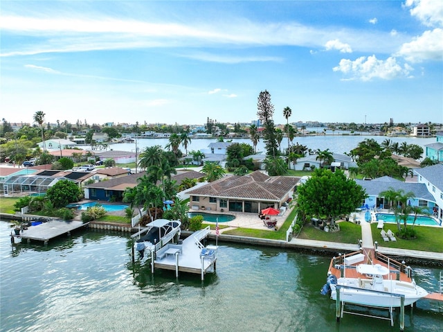 drone / aerial view featuring a water view