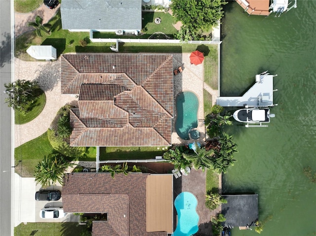 bird's eye view with a water view