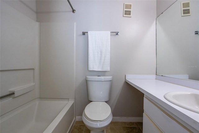 full bathroom with vanity, toilet,  shower combination, and tile patterned flooring