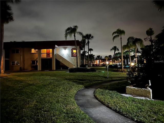 view of community featuring a yard