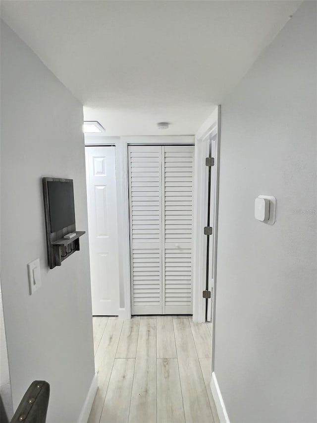 hallway featuring light hardwood / wood-style floors