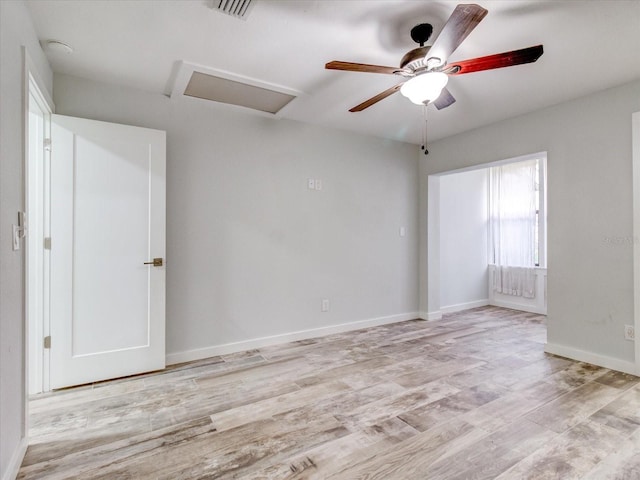 unfurnished room featuring ceiling fan and light hardwood / wood-style floors