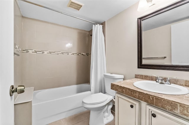 full bathroom featuring shower / tub combo with curtain, vanity, toilet, and tile patterned flooring