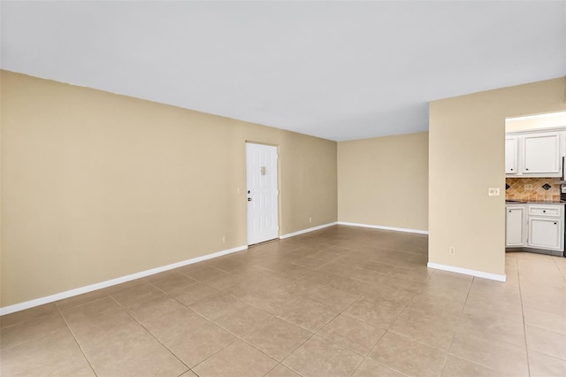 view of tiled spare room