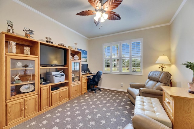 carpeted office space with ornamental molding and ceiling fan