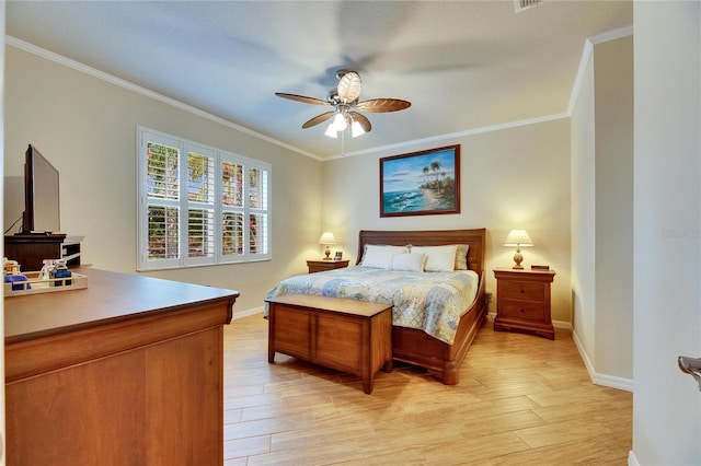 bedroom featuring crown molding, ceiling fan, and light wood-type flooring