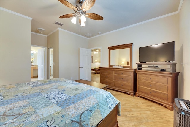 bedroom featuring ornamental molding, ceiling fan, and light wood-type flooring