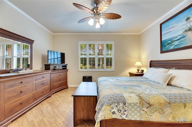 bedroom with crown molding, light wood-type flooring, and ceiling fan